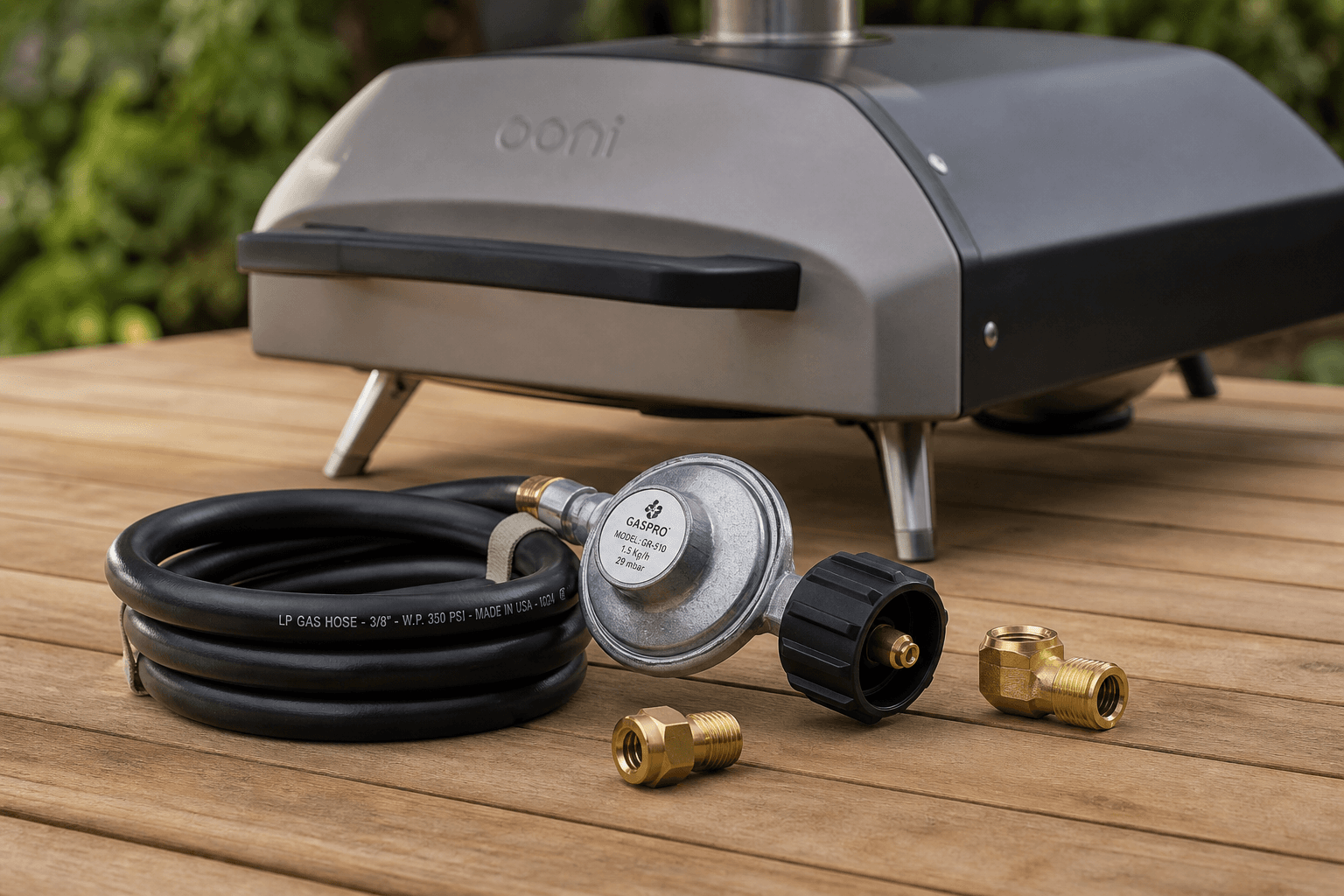 Gasregulator og slange ved pizzaovn